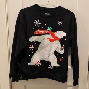 Coca Cola Bear Sweatshirt.  Lights up red and green flashes.‎  Black.